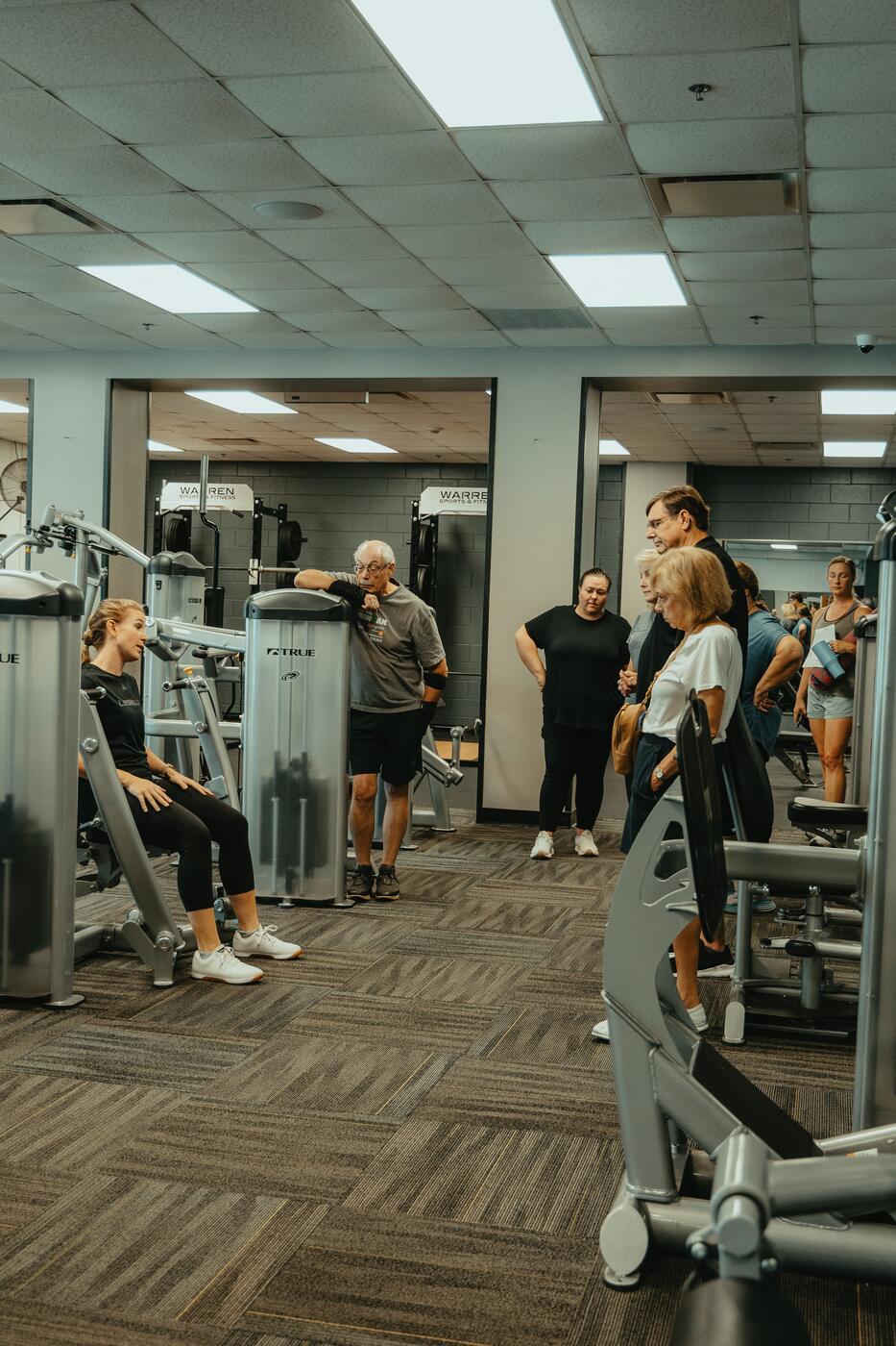 Members training in the weight room.